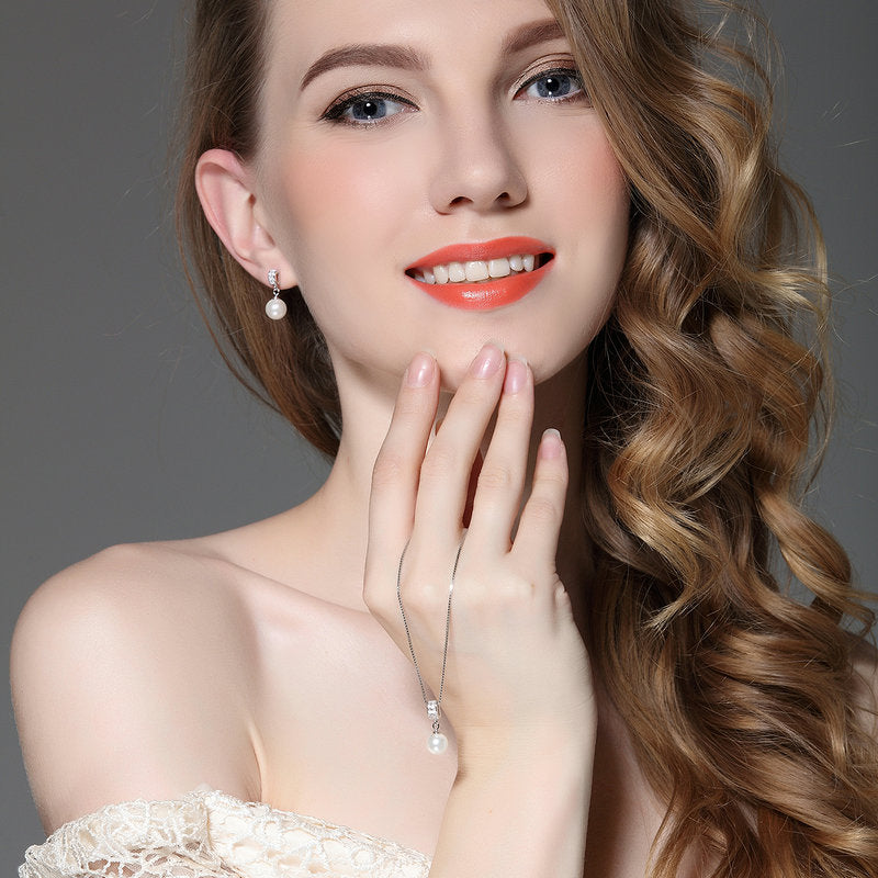 Star Drop Earrings With Clear CZ Pearl